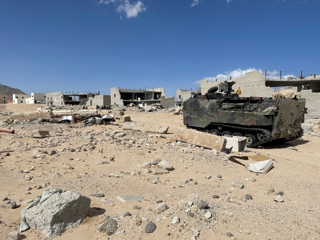 Assault Amphibian Unit Leaders (AAUL) Course conducting Close-Quarters Combative contingencies while utilizing the Defense Advanced GPS Receiver (DAGR) to box-scan and survey the immediate compound.