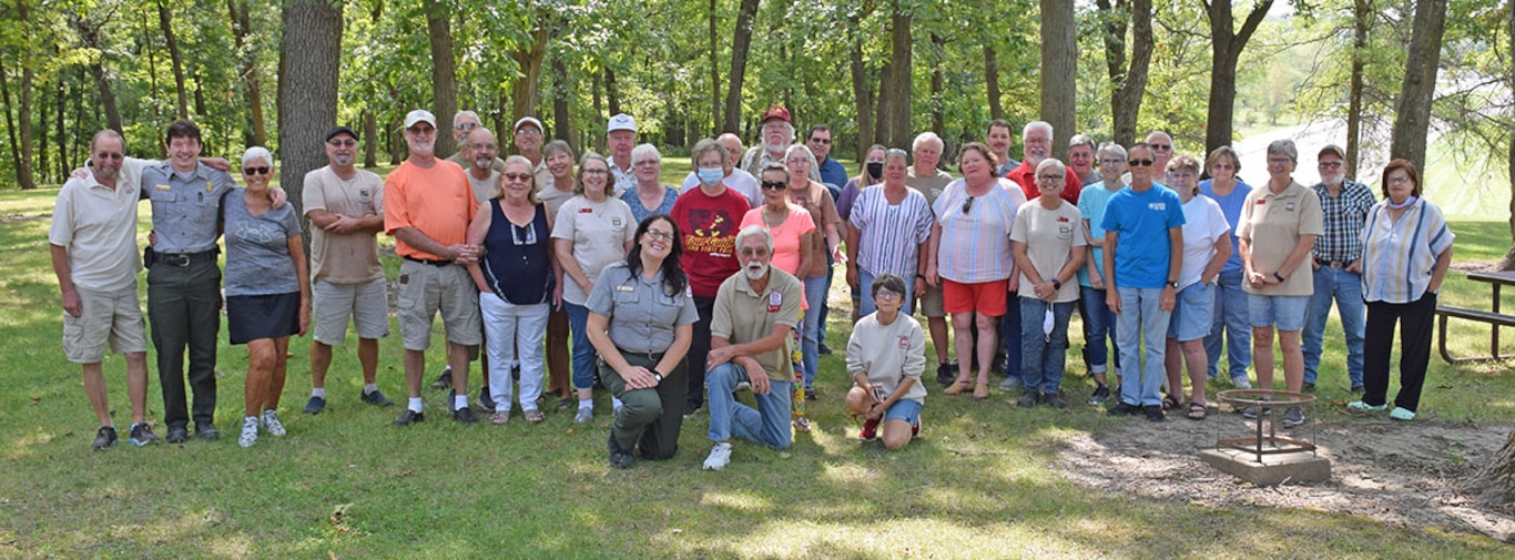 Staff from Lake Red Rock stand with the team of volunteers who helped to operate and maintain recreation areas at Iowa's largest lake during the 2021 camping season.
