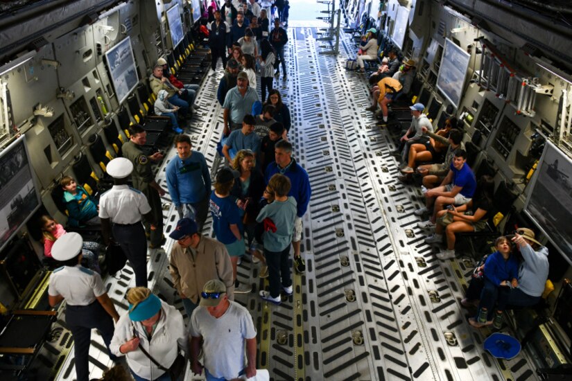 Attendees tour a C-17 Globemaster III at the Titans of Flight Air Expo, Joint Base Charleston, South Carolina, April 10, 2022.