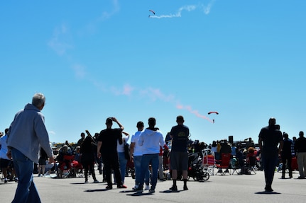 The U.S. Army Special Operations Command parachute team, the Black Daggers, demonstrate their skills at the Titans of Flight Air Expo, Joint Base Charleston, South Carolina, April 8, 2022.