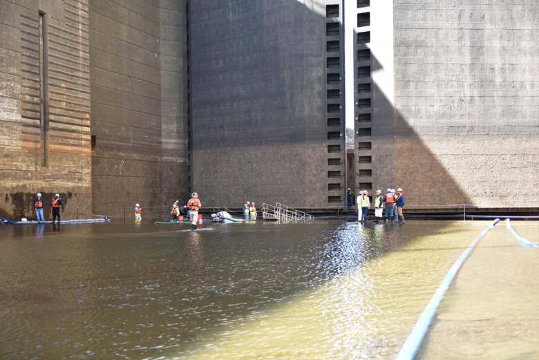 TVA and U.S. Army Corps of Engineers maintenance crews Maintenance crews prepare to enter below the chamber to inspect valves at Wilson Lock on April 7, 2022.