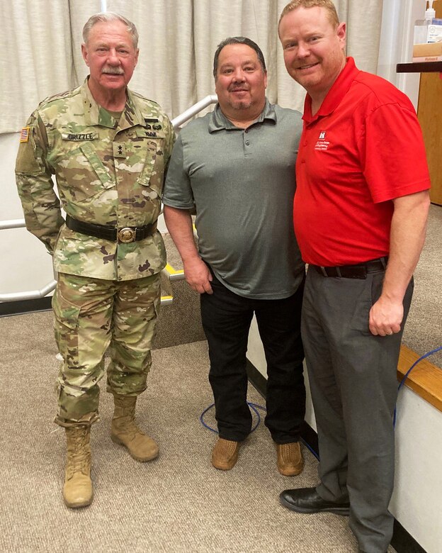 NMMI Superintendent Maj. Gen. (Ret.) Jerry Grizzle, Gary Cordova (center), and Shane Lauritzen (right), meet during a visit to the NMMI, Feb. 22, 2022.