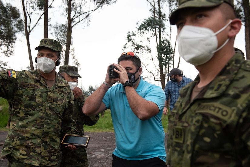 Senior Master Sgt. Matt Wilt (center), 123rd Explosive Ordnance Disposal Flight superintendent, provides field training to Ecuadorian Army soldiers to use new demining equipment on Feb. 23, 2022, in Sangolquí, Ecuador. The equipment, from U.S. Southern Command, will be used to help clear the last remaining part of the country's southern border so it can be returned to the local population for farming and other activities. (U.S. Air National Guard photo by Lt. Col. Allison Stephens)