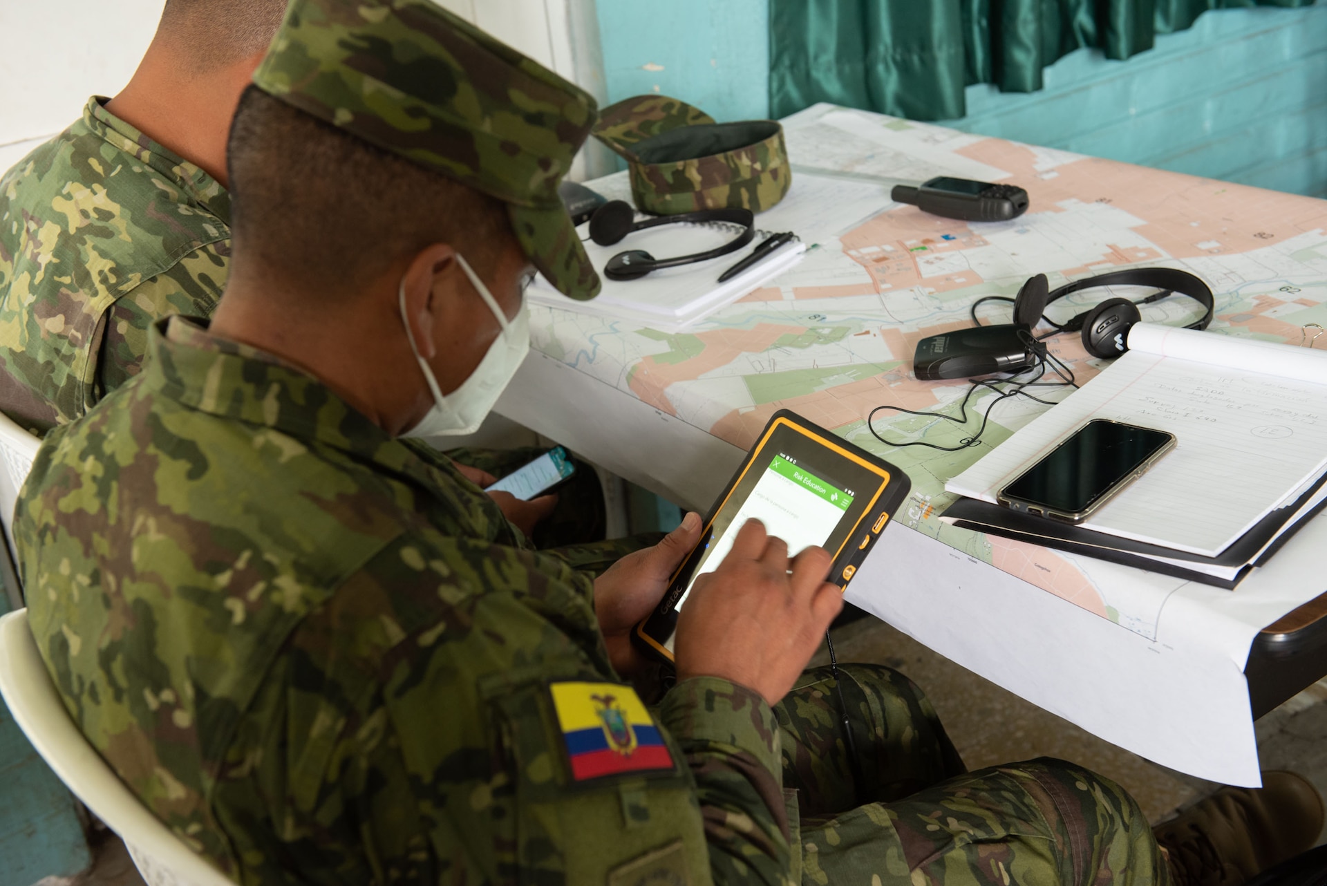 Ecuadorian Army soldiers receive in-class training in preparation to utilize new demining equipment from U.S. Southern Command on Feb. 23, 2022, in Sangolquí, Ecuador. The equipment will be used to help clear the last remaining part of the country's southern border so it can be returned to the local population for farming and other activities. (U.S. Air National Guard photo by Lt. Col. Allison Stephens)
