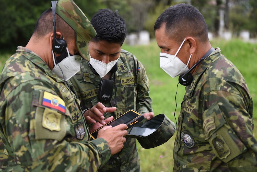 Ecuadorian Army soldiers utilize new demining equipment in the field on Feb. 23, 2022, in Sangolquí, Ecuador. The equipment, from U.S. Southern Command, will be used to help clear the last remaining part of the country's southern border so it can be returned to the local population for farming and other activities. (U.S. Air National Guard photo by Lt. Col. Allison Stephens)