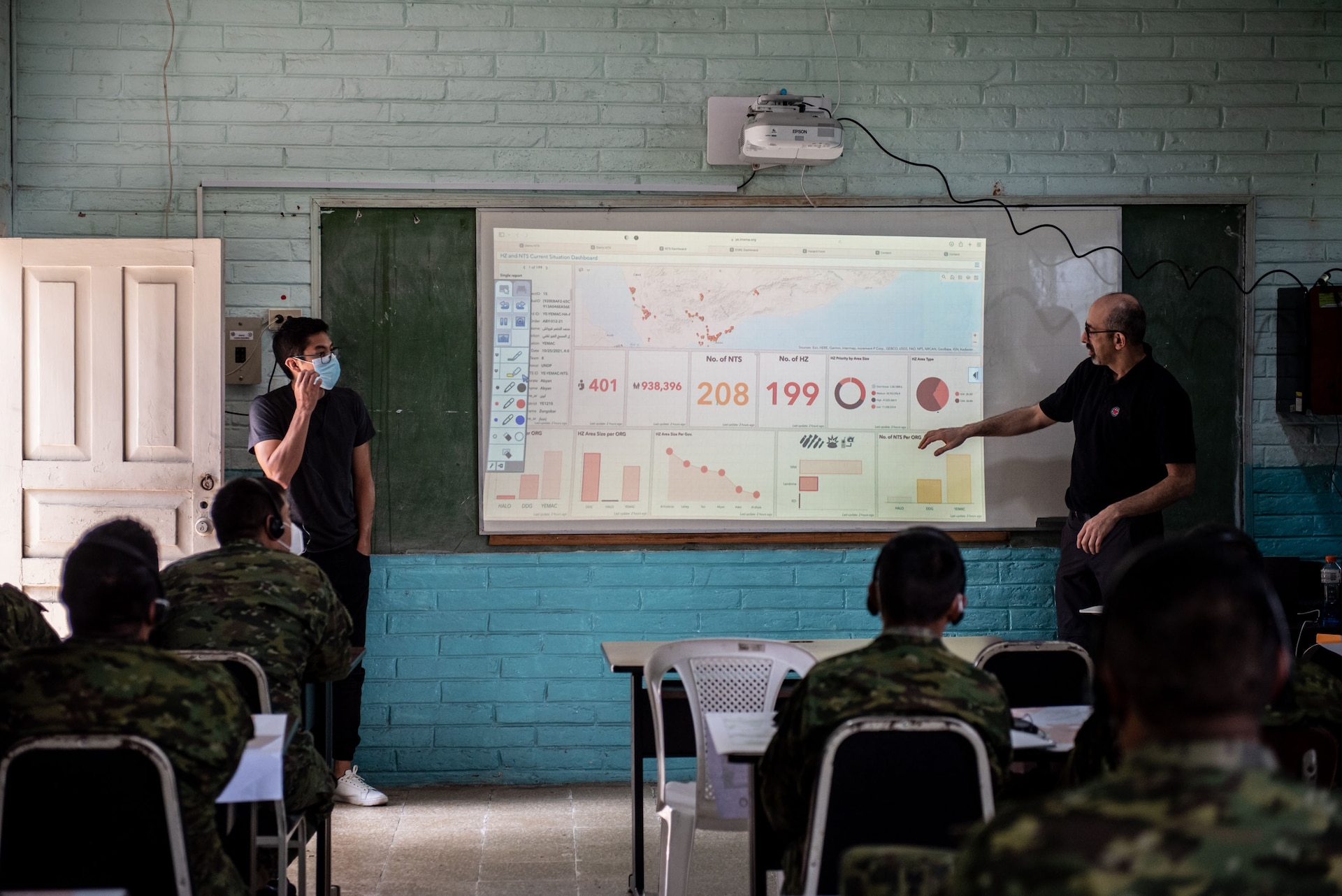Ecuadorian Army soldiers receive in-class training in preparation to utilize new demining equipment from U.S. Southern Command on Feb. 23, 2022, in Sangolquí, Ecuador. The equipment will be used to help clear the last remaining part of the country's southern border so it can be returned to the local population for farming and other activities. (U.S. Air National Guard photo by Lt. Col. Allison Stephens)
