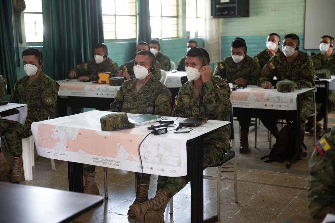 Ecuadorian Army soldiers receive in-class training in preparation to utilize new demining equipment from U.S. Southern Command on Feb. 23, 2022, in Sangolquí, Ecuador. The equipment will be used to help clear the last remaining part of the country's southern border so it can be returned to the local population for farming and other activities. (U.S. Air National Guard photo by Lt. Col. Allison Stephens)