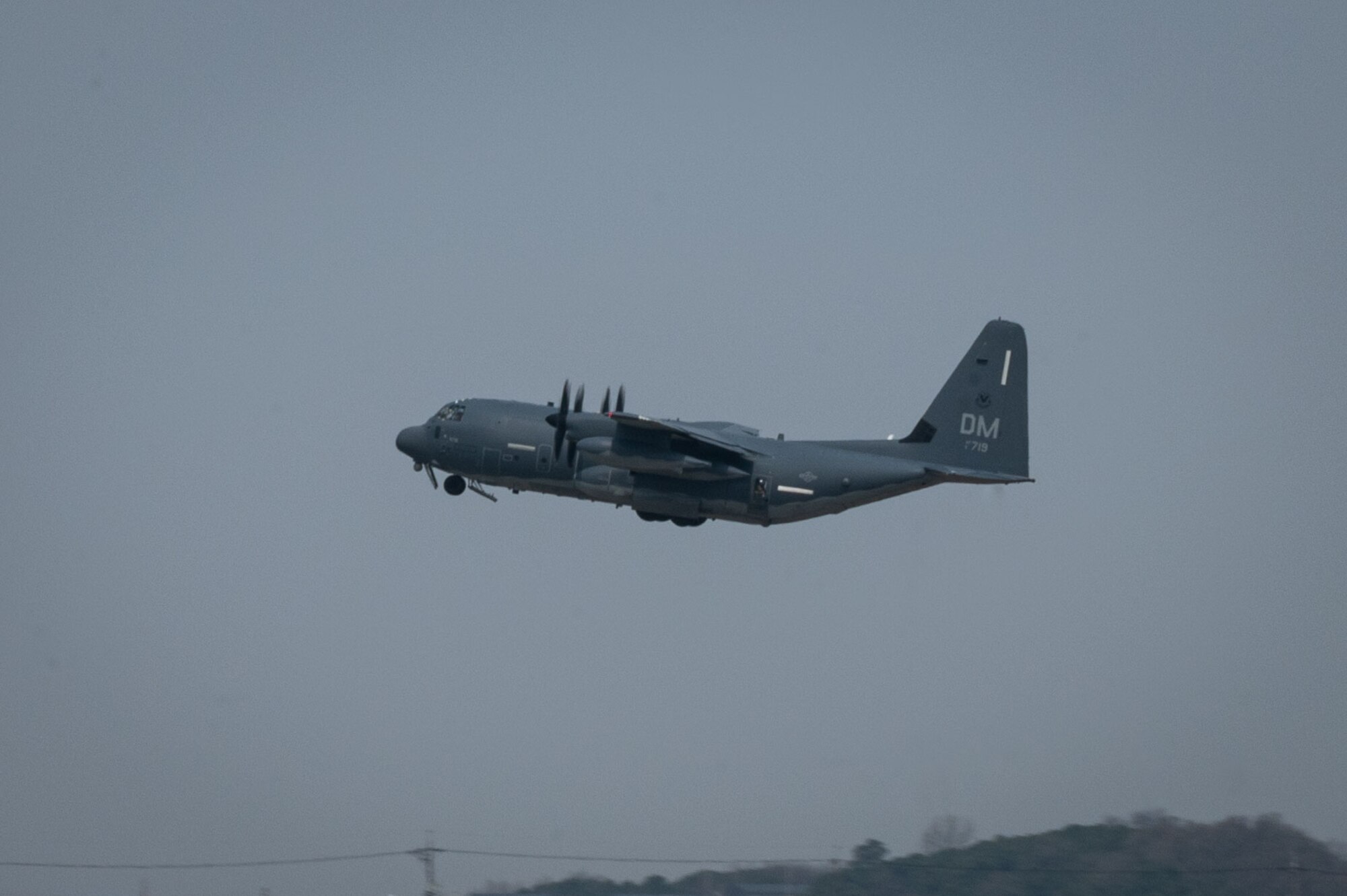 A C-130J Hercules flies a during a Combat Search and Rescue Training Event April 8, 2022. More than 200 joint personnel and 27 participating squadrons from across the Pacific participated in CSARTE 22-2. The goals for CSARTE is to create realistic combat search and rescue training with both joint and combined forces. The scenarios include preplanned and immediate survivor pickup locations that require detailed integration of assets and planning in order to execute a safe recovery of a simulated downed aircraft. (U.S. Air Force photo by Senior Airman Megan Estrada)