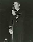 Lt. Buddy Ebsen on stage hosting the 7th War Loan bond drive in Seattle. (U.S. Coast Guard)