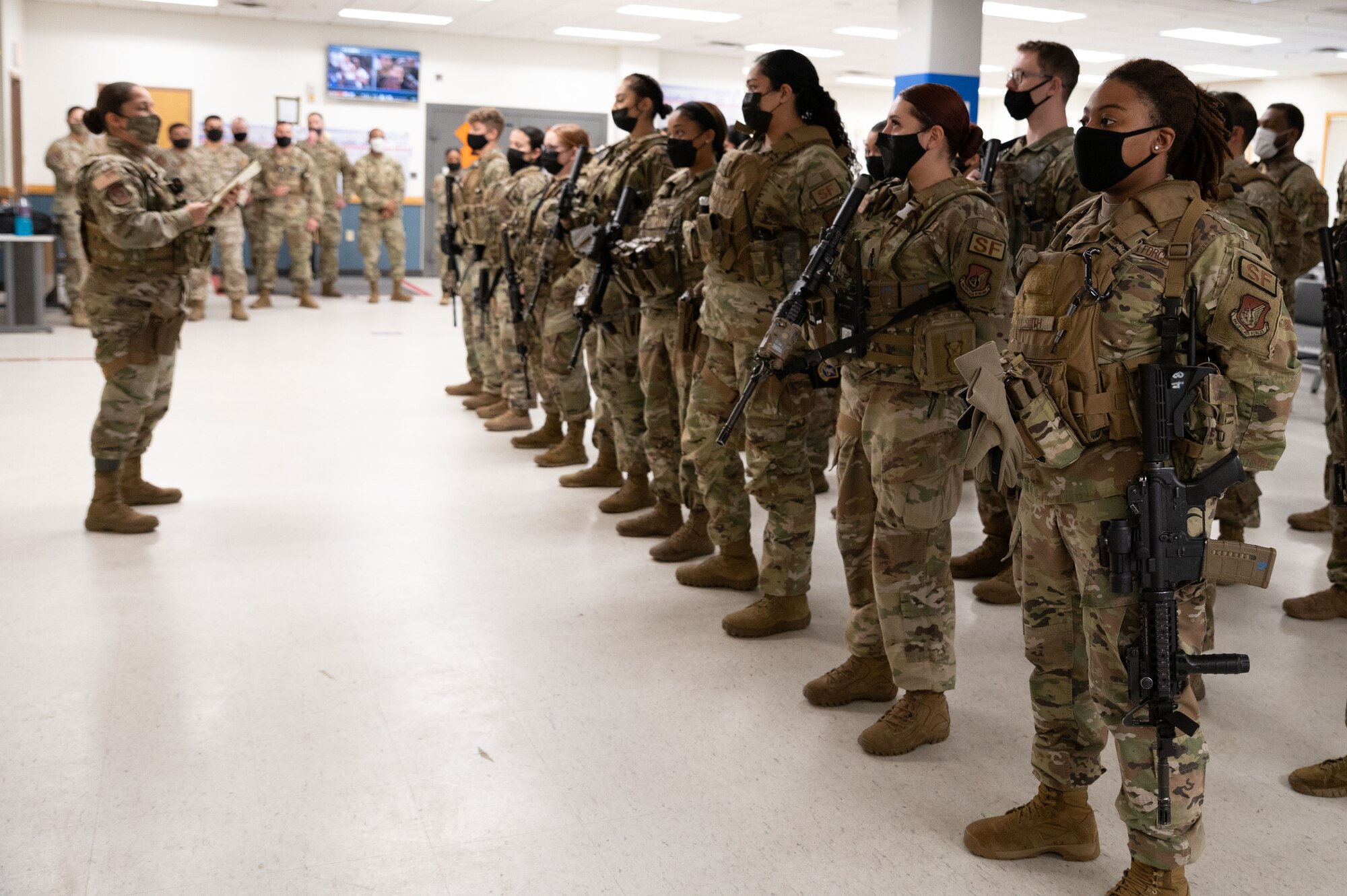 Master Sgt. Sonia Toro-Valles, 51st Security Forces Squadron flight chief, conducts roll call to a predominately female flight at Osan Air Base, Republic of Korea, March 31, 2022.