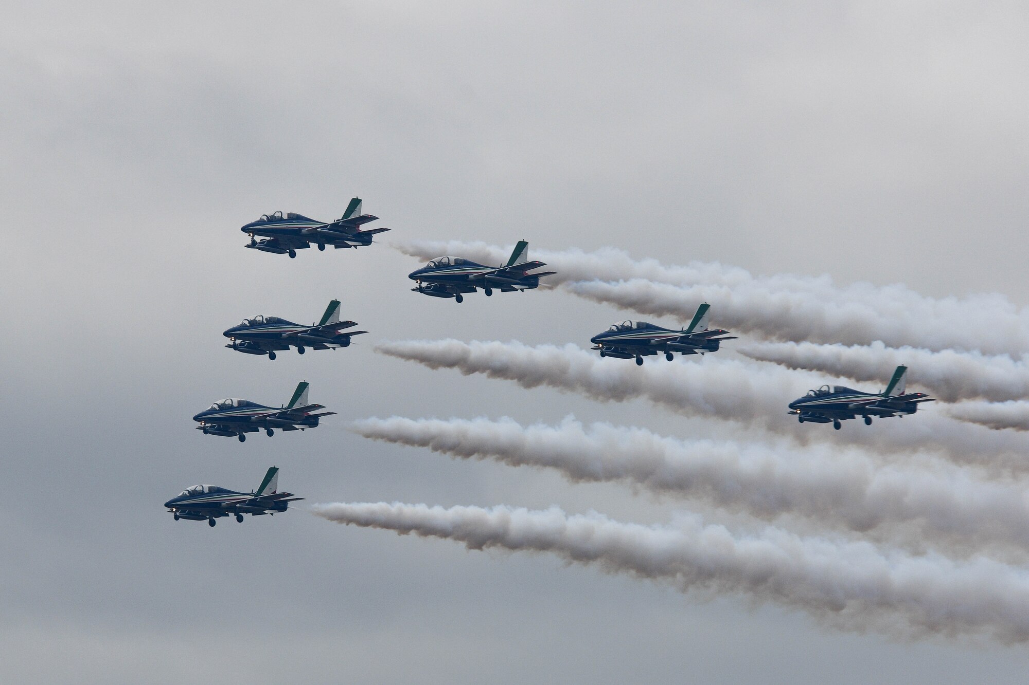 The Frecce Tricolori Italian air force aerobatics team performs expert aerial maneuvers during an open house at Aviano Air Base, Italy, April 1, 2022. Frecce Tricolori literally translates to tricolored arrows and the team is the world's largest military aerobatic team to perform aerial maneuvers. (U.S. Air Force photo by Senior Airman Brooke Moeder)