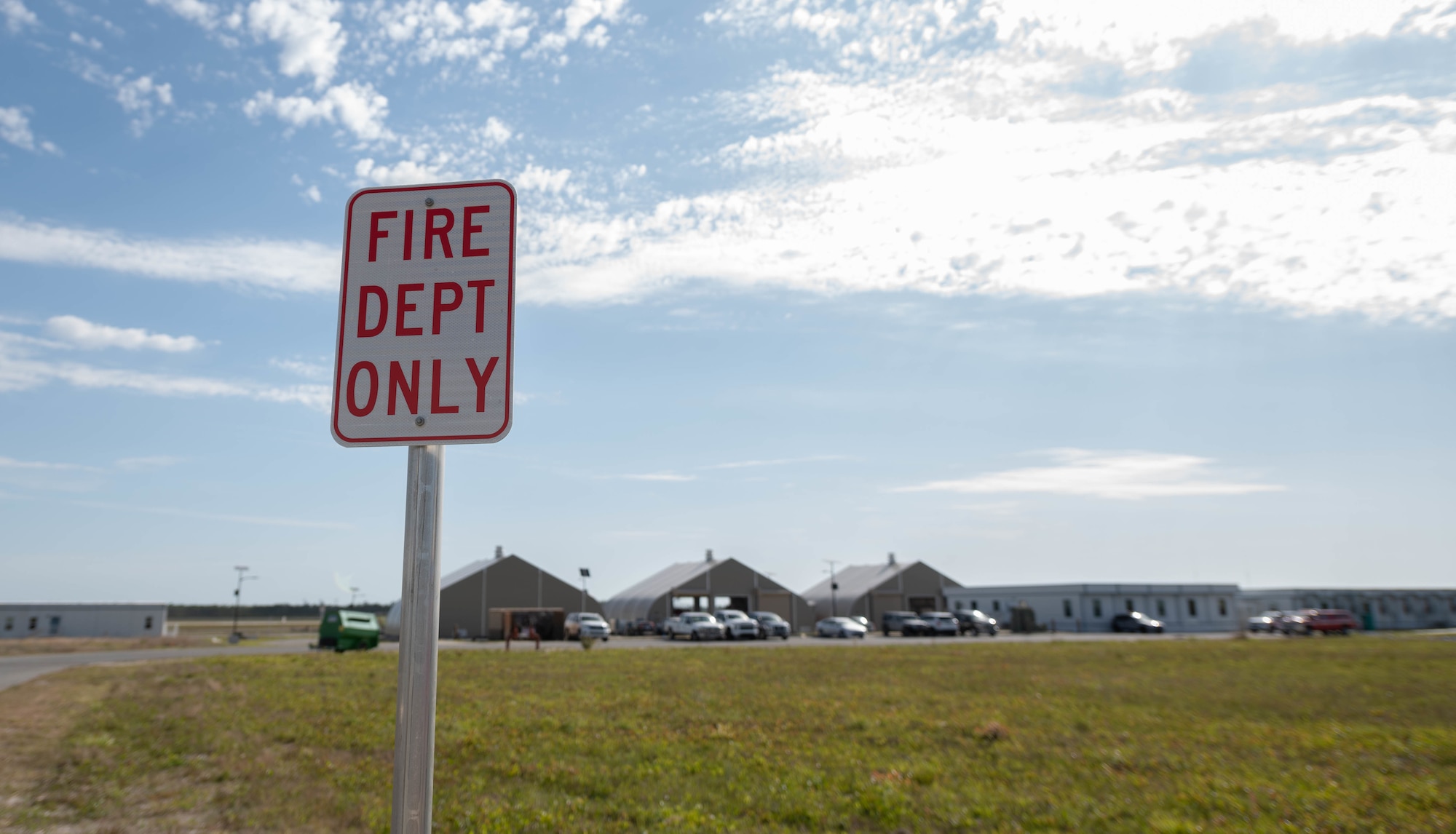 A sign reading fire department only sits outside the fire department.