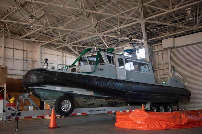 A security boat is stored in a warehouse at Marine Corps Air Station Iwakuni’s harbor, Feb. 25, 2022. This vessel is normally used to patrol the waters surrounding the installtion to ensure that only authorized personnel are accessing the air station’s harbor. MCAS Iwakuni’s deep-water harbor plays an essential part in helping supply units on the air station with necessary equipment and helping support different vessels traveling through the Indo-Pacific region.