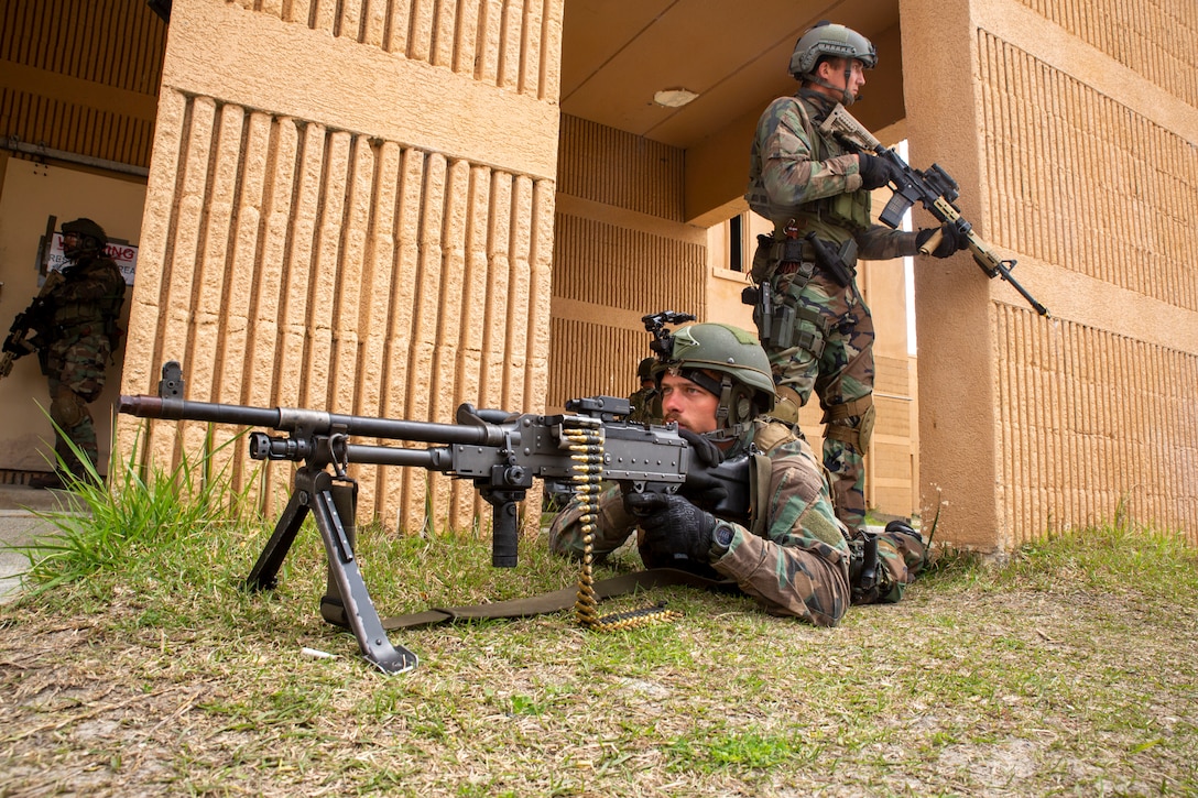 Dutch Marines with Marine Squadron Carib post security during a Movement on Urban Terrain training exercise, Camp Lejeune, N.C., March 31, 2022.
