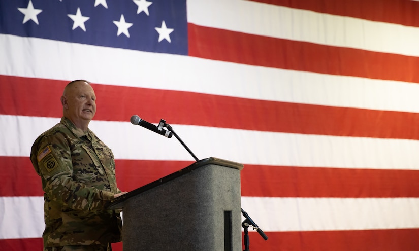 Col. James M. Palembas speaks to an audience of Alaska National Guardsmen and distinguished guests during a change of command ceremony at Joint Base Elmendorf-Richardson, April 9, 2022. Palembas most recently served as the chief of staff for the Alaska Army National Guard, and was chosen by Adjutant General, Maj. Gen. Torrence Saxe for the responsibility of being the Alaska Army National Guard’s top leader. (U.S. Army National Guard photo by Spc. Marc Marmeto)