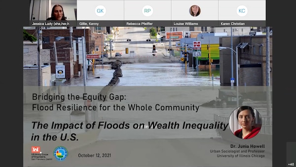 Photo of a flooded town with black text over it