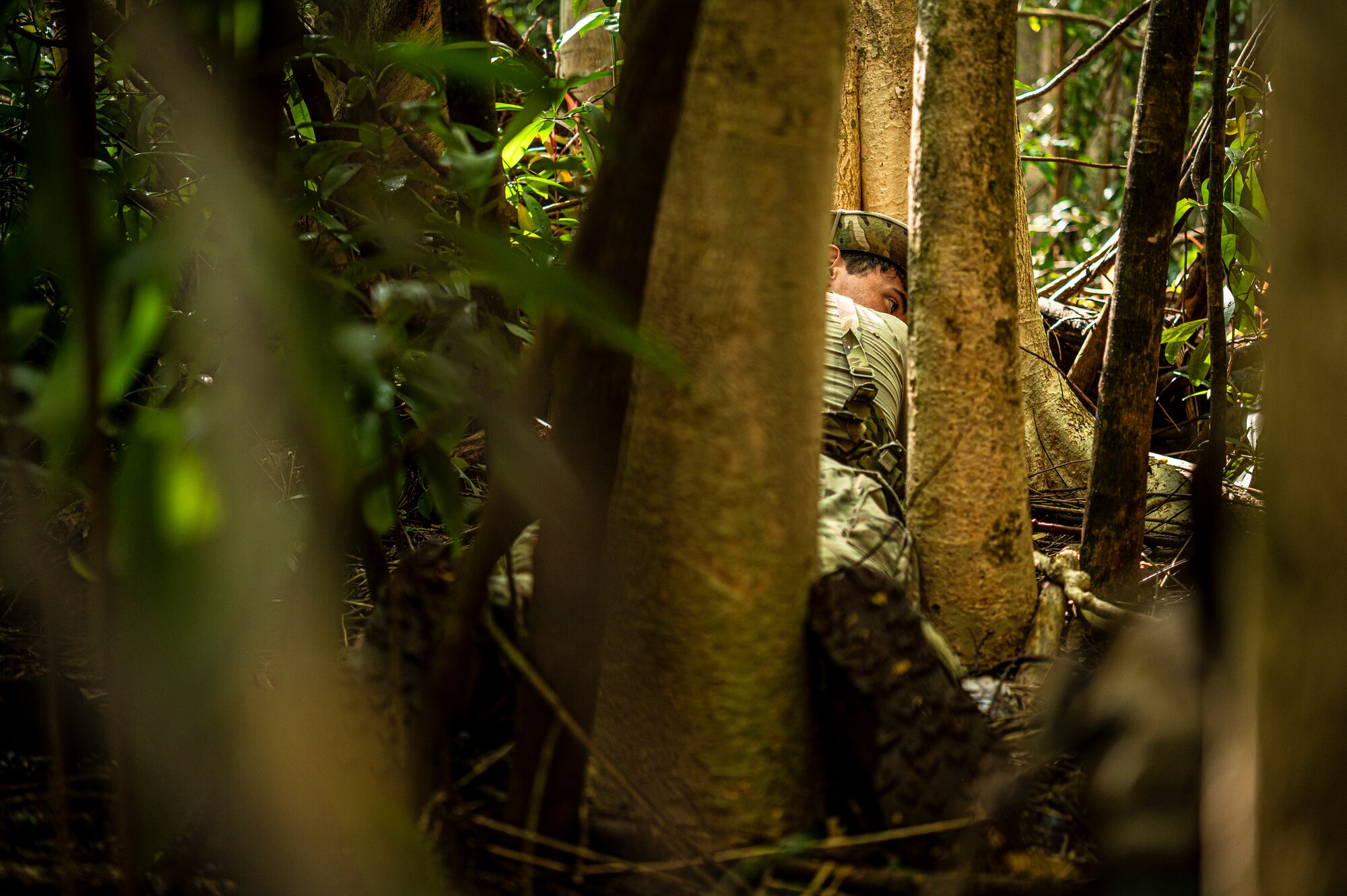 Photo of Airman laying on the ground