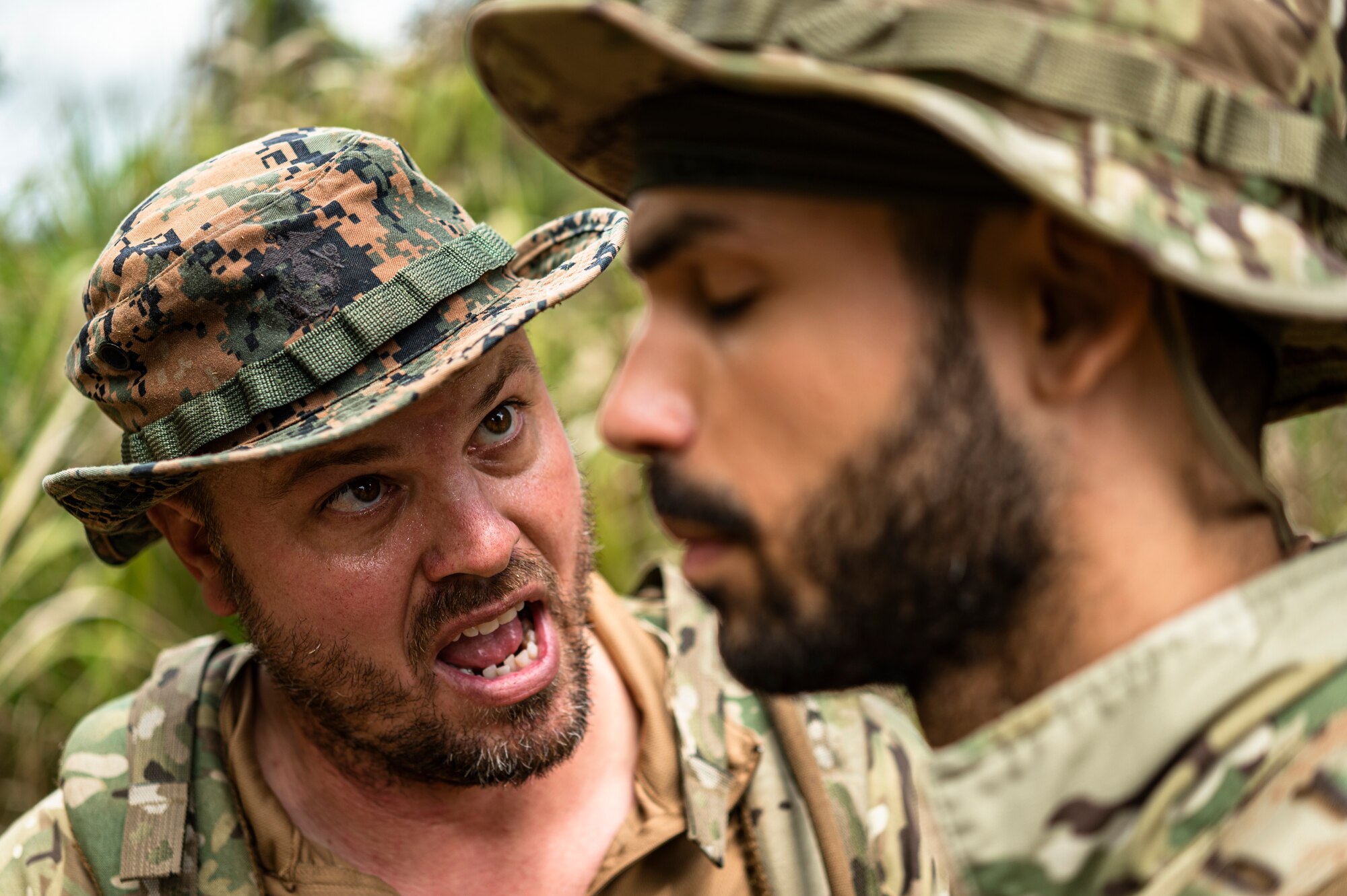 Photo of two men conversing