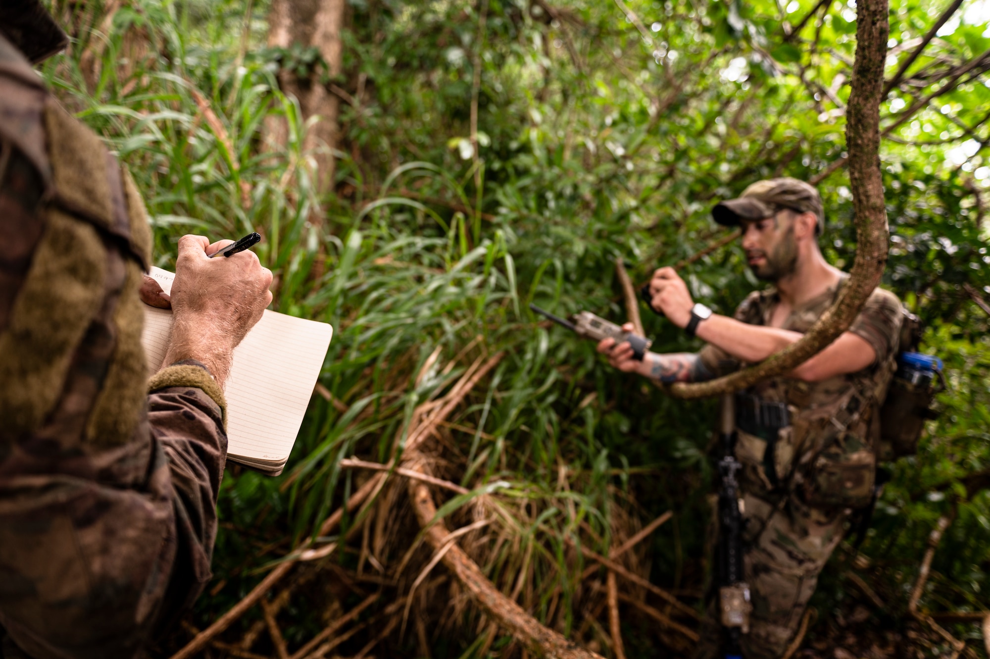 Photo of Airmen in the jungle