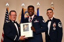 U.S. Air Force Staff Sgt. Makevis Duncan receives the John L. Levitow Award during the graduation ceremony for Airman Leadershop School, Class 22-D