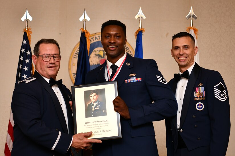 U.S. Air Force Staff Sgt. Makevis Duncan receives the John L. Levitow Award during the graduation ceremony for Airman Leadershop School, Class 22-D