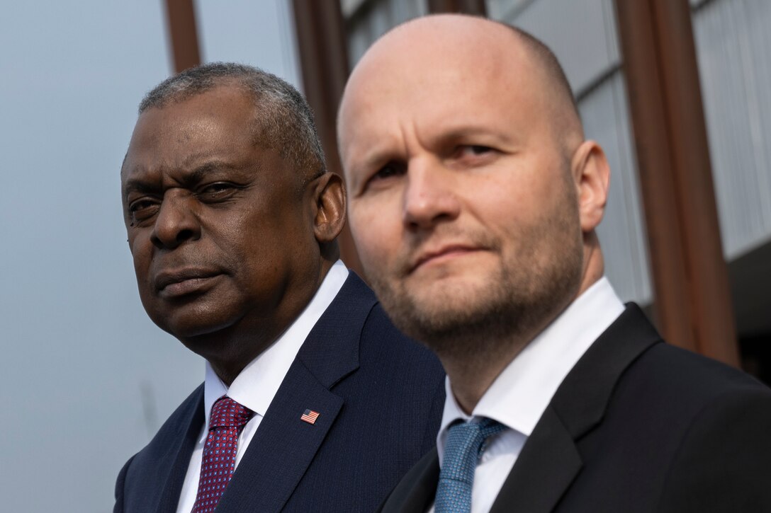 Secretary of Defense Lloyd J. Austin III stands with Slovakia Defense Minister.