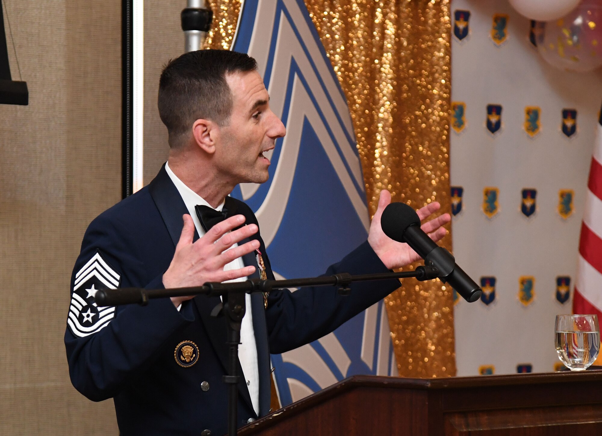 U.S. Air Force Chief Master Sgt. Lee Hoover, Jr., 42nd Air Base Wing command chief, Maxwell Air Force Base-Gunter Annex, Alabama, delivers remarks during the Chief Master Sergeant Recognition Ceremony inside the Bay Breeze Event Center at Keesler Air Force Base, Mississippi, April 8, 2022. Four Keesler Airmen earned their chief master sergeant stripe during the 2022 promotion release. Chief master sergeants make up one percent of the Air Force enlisted force. (U.S. Air Force photo by Kemberly Groue)