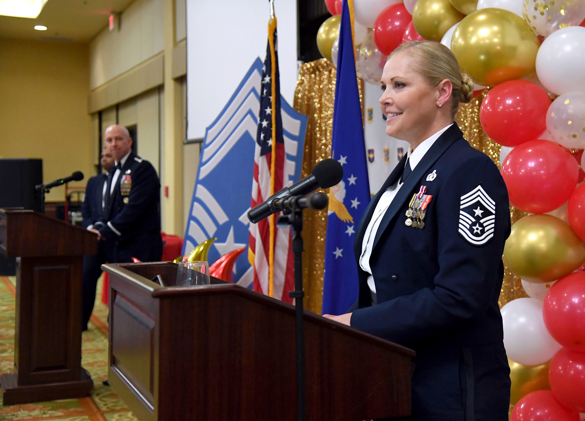 U.S. Air Force Chief Master Sgt. Sarah Esparza, 81st Training Wing command chief, delivers remarks during the Chief Master Sergeant Recognition Ceremony inside the Bay Breeze Event Center at Keesler Air Force Base, Mississippi, April 8, 2022. Four Keesler Airmen earned their chief master sergeant stripe during the 2022 promotion release. Chief master sergeants make up one percent of the Air Force enlisted force. (U.S. Air Force photo by Kemberly Groue)