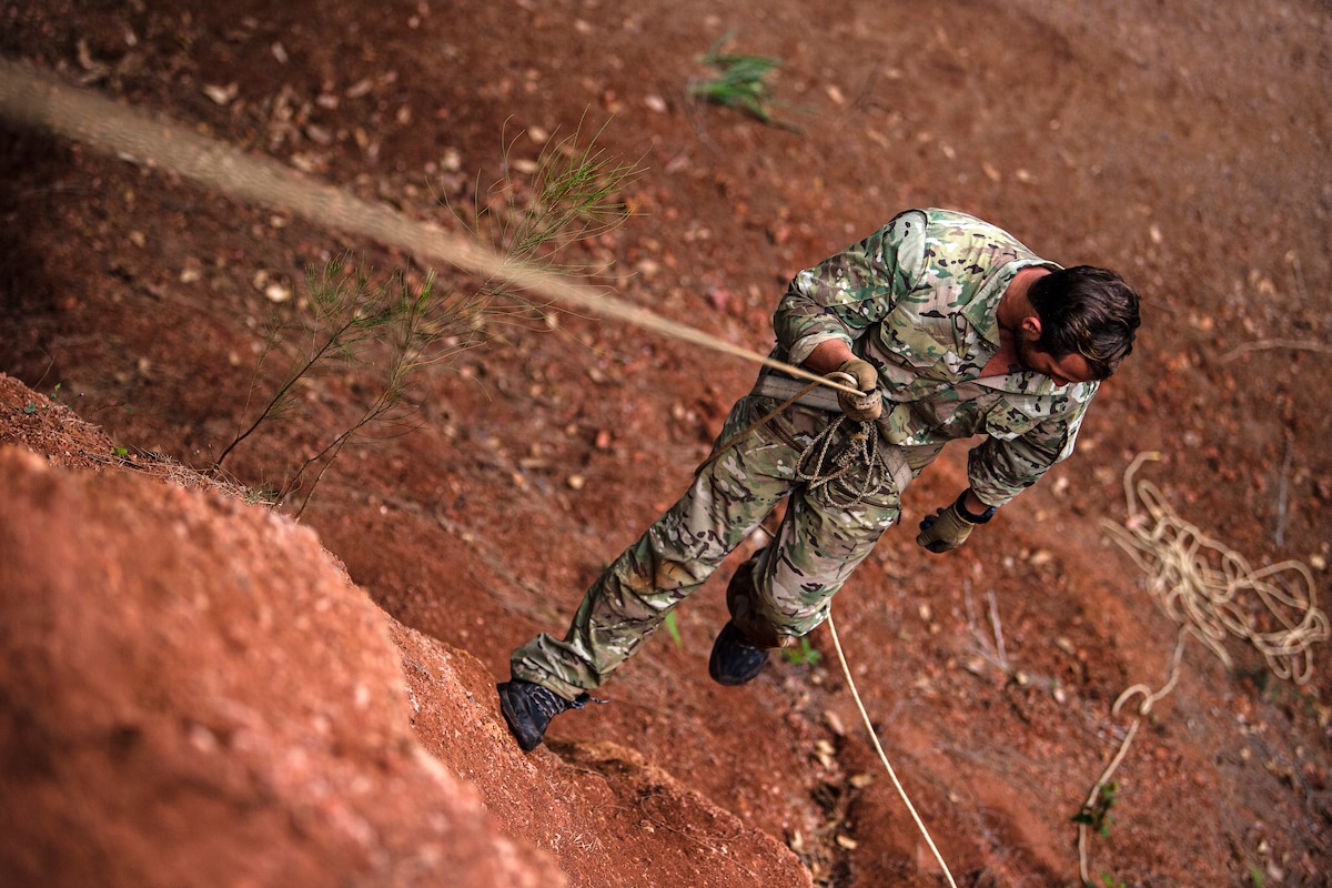 Photo of Airman rappelling