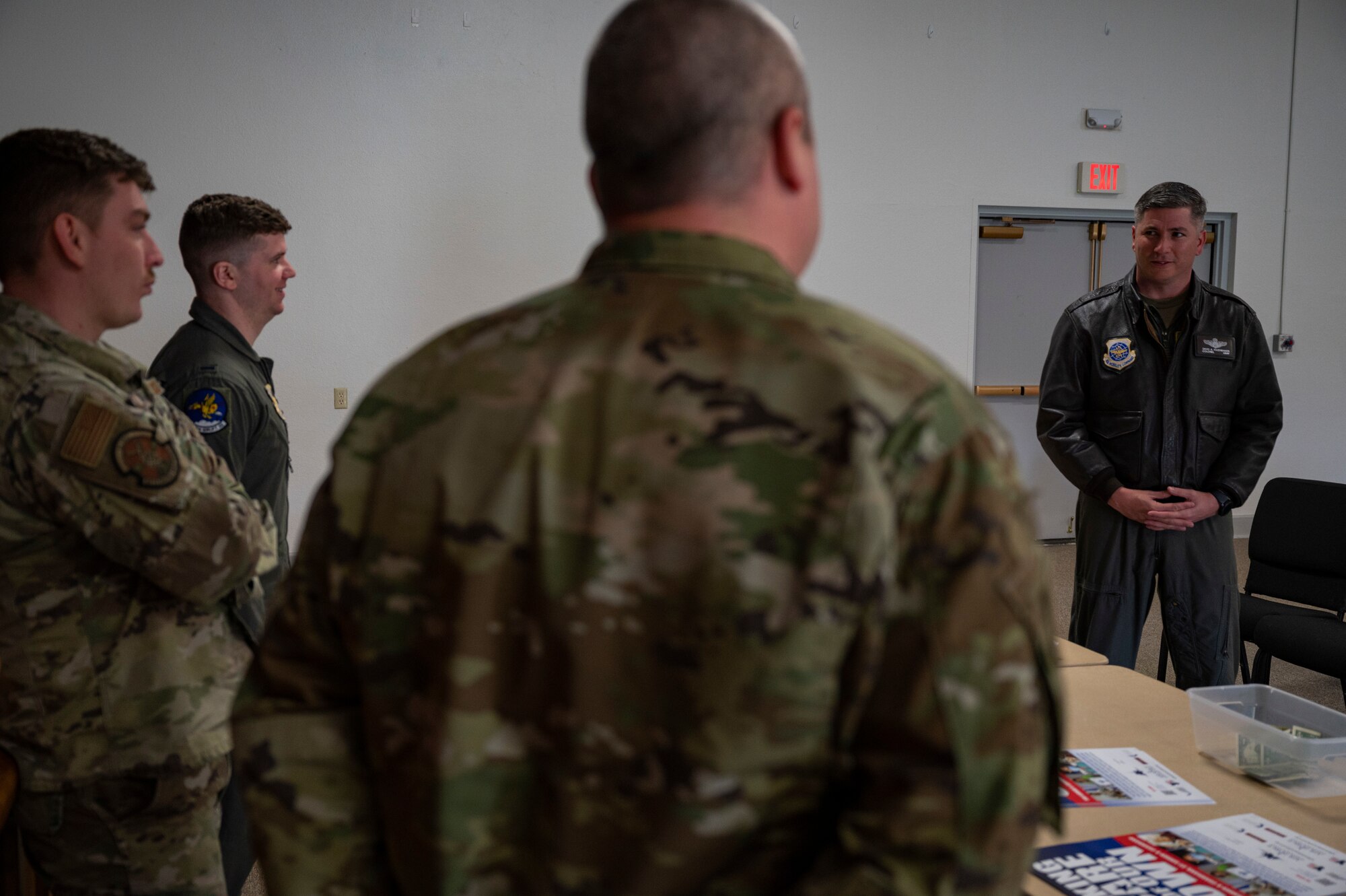 U.S. Air Force Col. David A. Fazenbaker, 62nd Airlift Wing commander, talks with project officers for the Air Force Assistance Fund at Joint Base Lewis-McChord, Washington, April 11, 2022. Currently, there are three ways to donate. The first and preferred method is through e-giving. To donate electronically, donors can text “AFAF” to 50155 or visit https://secure.qgiv.com/event/afaf/team/895681/. People can also donate by payroll deduction plans and through cash or check. (U.S. Air Force photo by Airman 1st Class Charles Casner)