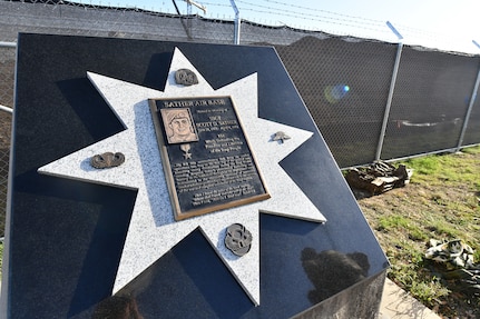 The newly refitted memorial for U.S. Air Force Staff Sgt. Scott Sather at the Special Warfare Training Wing training compound Joint Base San Antonio, Chapman Training Annex, Apr. 8, 2022. The wing and echelon units hosted a two and one-half mile ruck march followed by Memorial pushups and the unveiling of refitted memorials in coordination with Gold Star families (U.S. Air Force photo by Brian Boisvert)