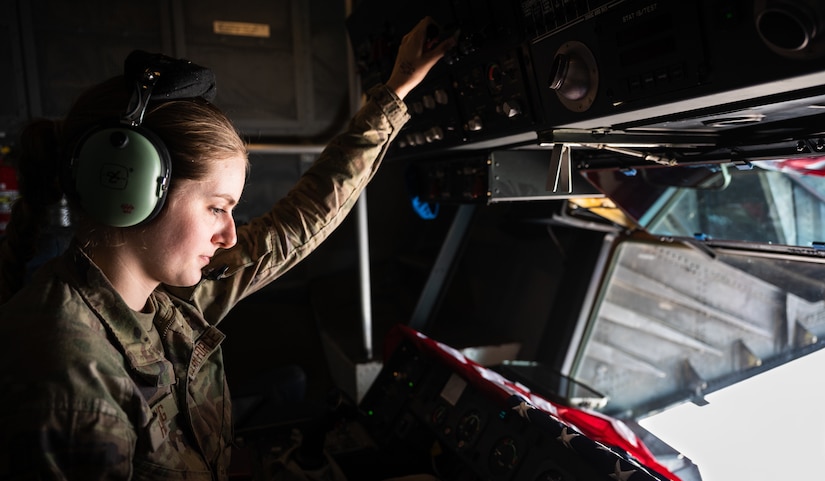 U.S. Air Force Airman 1st Class Lauren Hotaling, 908th Expeditionary Air Refueling Squadron in-flight refueling specialist, operates a refueling boom in a KC-10 Extender over the U.S. Central Command area of responsibility, April 7, 2022. Airmen of the 908th EARS provide advanced tanker and cargo capabilities and can refuel U.S., ally and partner nation military aircraft. (U.S. Air Force photo by Senior Airman Jacob B. Wrightsman)