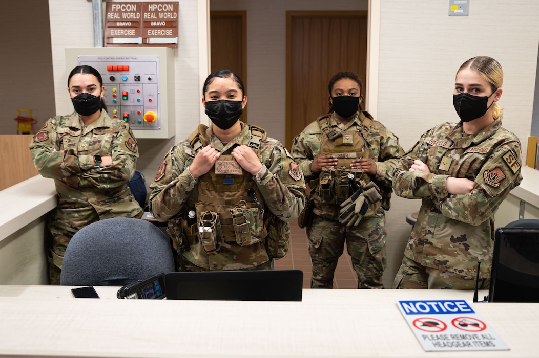 Female Airmen assigned to the 51st Security Forces Squadron, perform entry controller duties at Osan Air Base, Republic of Korea, Mar. 31, 2022.