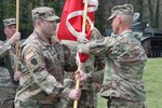Lt. Col. Joseph M. Fleishman takescommand of the Virginia National Guard’s Petersburg-based 276th Engineer Battalion, 329th Regional Support Group, from Lt. Col. Demetrius D. Parrott in a change of command ceremony April 10, 2022, at Defense Supply Center Richmond, Virginia.