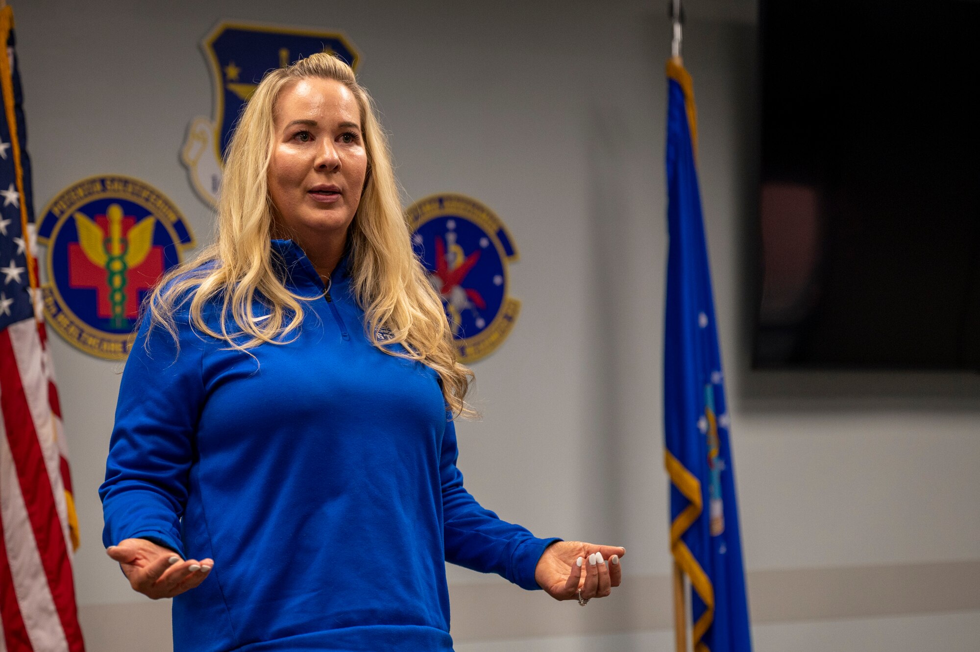Melissa Wiest, Air Force Wounded Warrior (AFW2) program staff member, gives a brief to Airmen assigned to the 19th Medical Group
