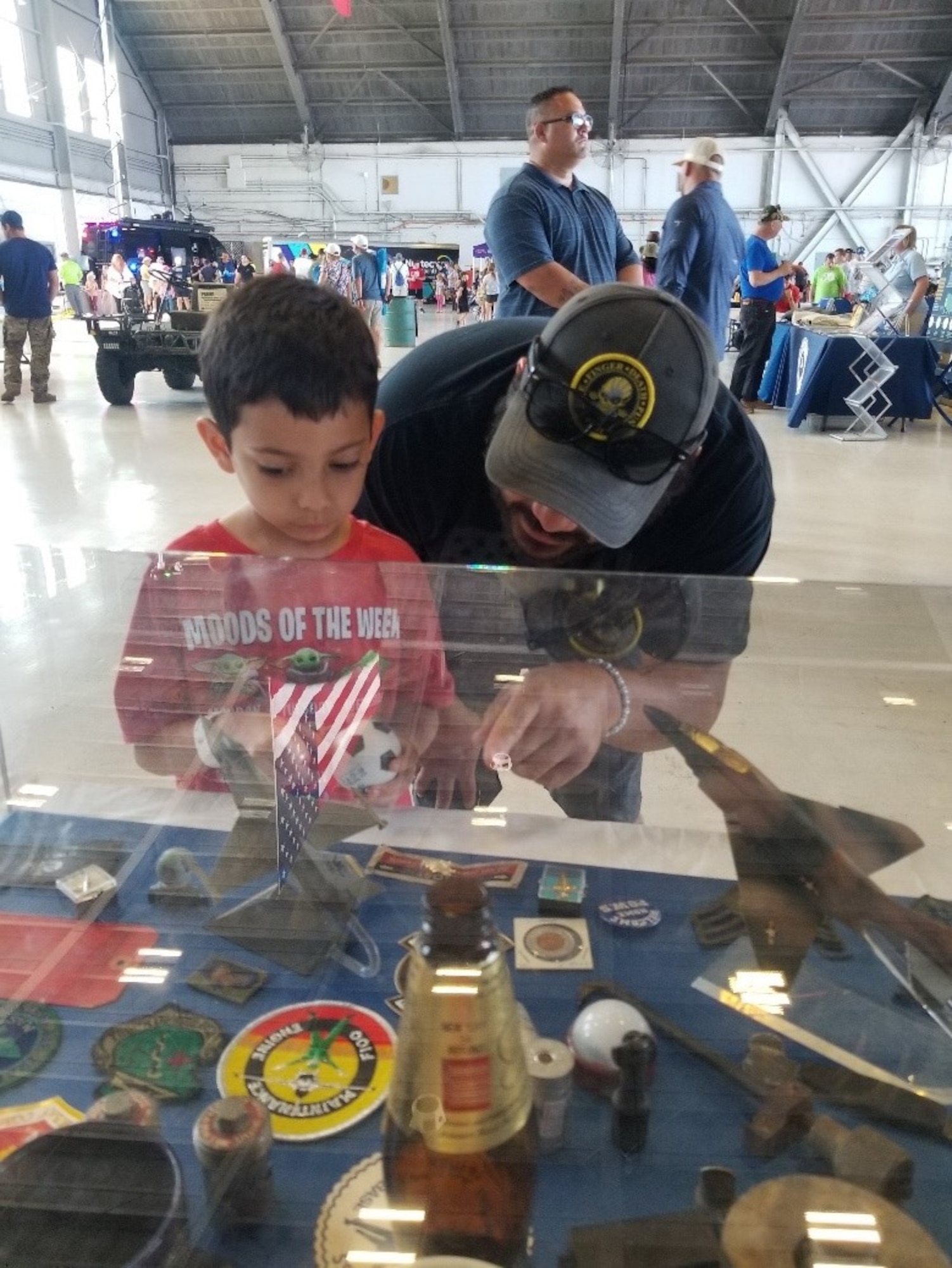 At the AirFest history display, U.S. Air Force veterans use the exhibits to interpret Air Force history with guests and each other during the 2022 Tampa Bay AirFest at MacDill Air Force Base, Florida, March 25-27. Nearly 185,000 guests gathered to commemorate the Air Force’s 75 years of global air superiority during the event, bolstering community support and inspiring past, present and future Airmen. (Courtesy photo)