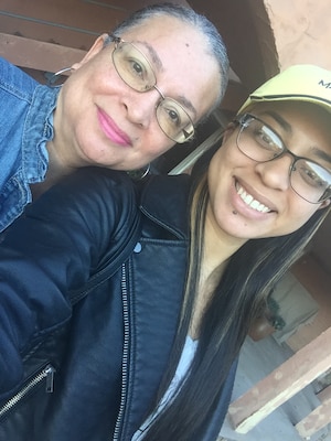 Lita Trotter and her daughter Alexandria pose for a recent photo together. Trotter said she liked to work on puzzles while listening to good music in her spare time.