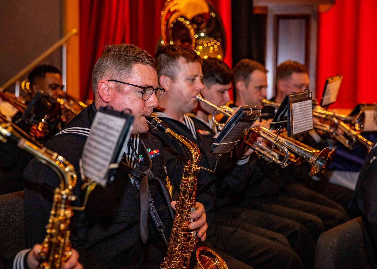 Members of the U.S. 7th Fleet Band perform during the Submarine Group 7 change of command ceremony at Commander, Fleet Activities Yokosuka, Japan, on April 13, 2022. Submarine Group 7 directs forward-deployed, combat capable forces across the full spectrum of undersea warfare throughout the Western Pacific, Indian Ocean, and Arabian Sea.