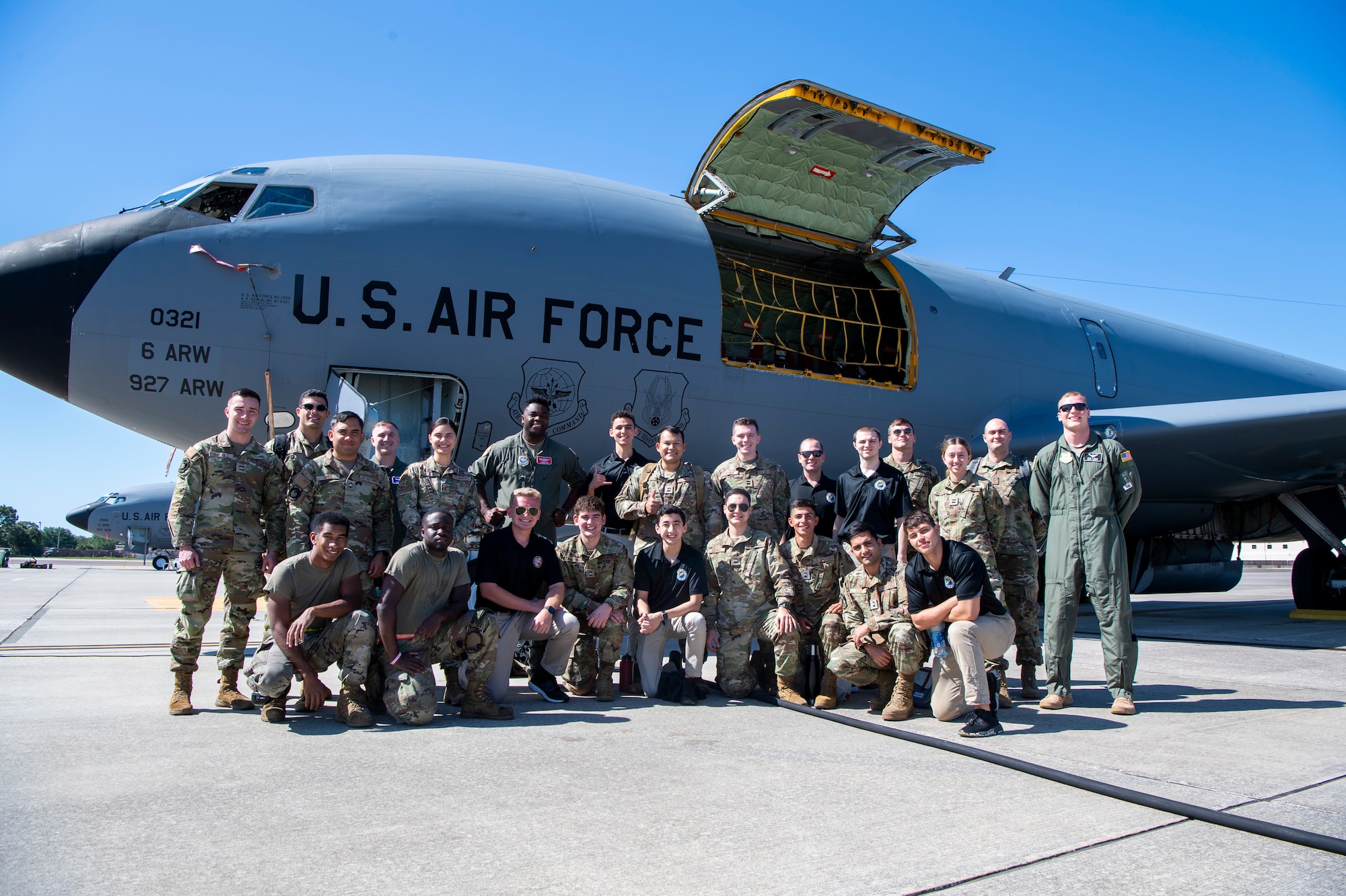Cadets with Air Force ROTC Detachment 159 at the University of Central Florida pose for a photo in front of a KC-135 Stratotanker assigned to the 91st Air Refueling Squadron at MacDill Air Force Base, Florida, April 11, 2022.