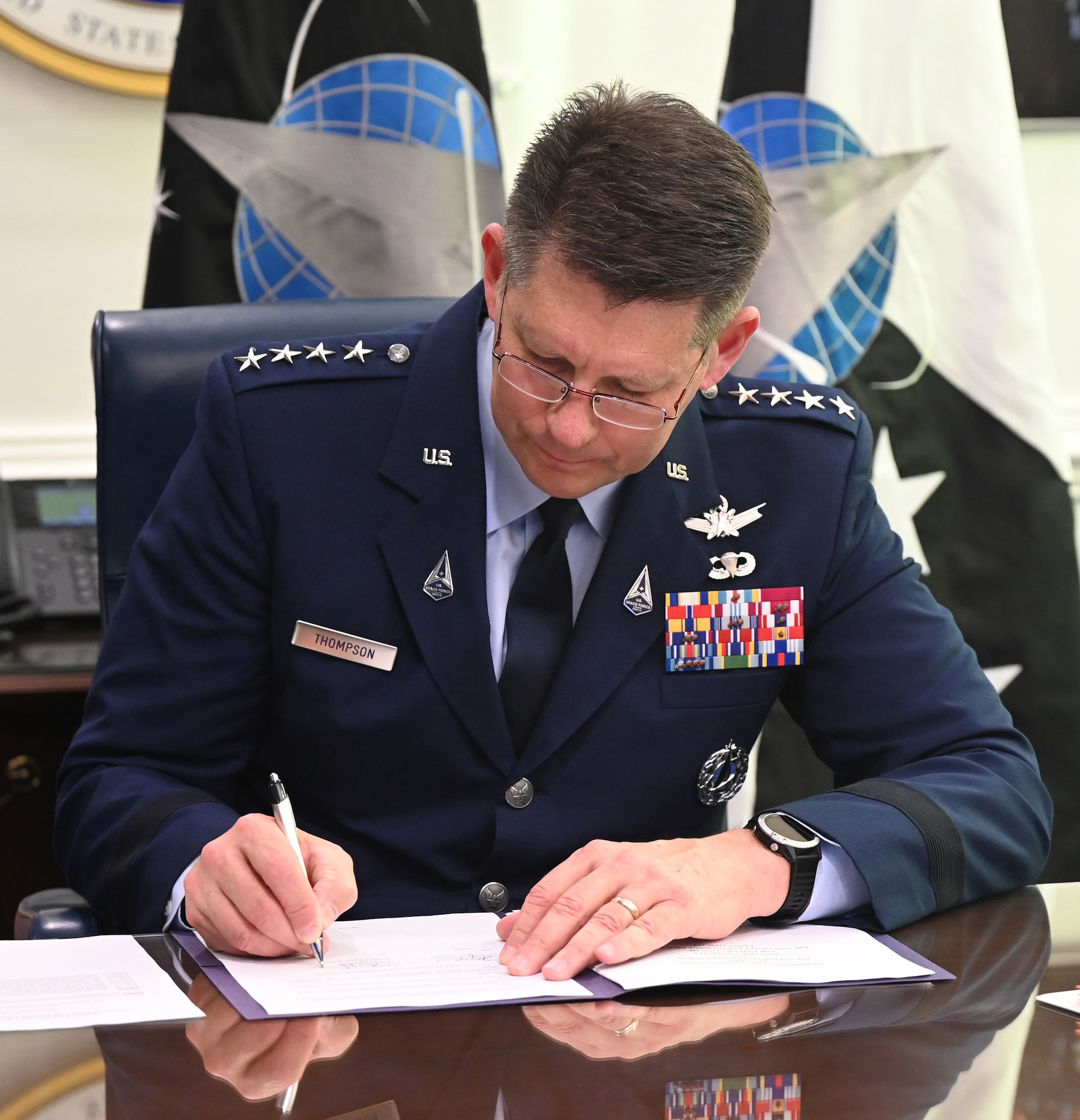 Vice Chief of Space Operations General David Thompson welcomes Howard University to the University Partnership Program by signing a memorandum of understanding during a virtual ceremony in the Pentagon, Arlington, VA, April 11, 2022. (U.S. Air Force photo by Andy Morataya)