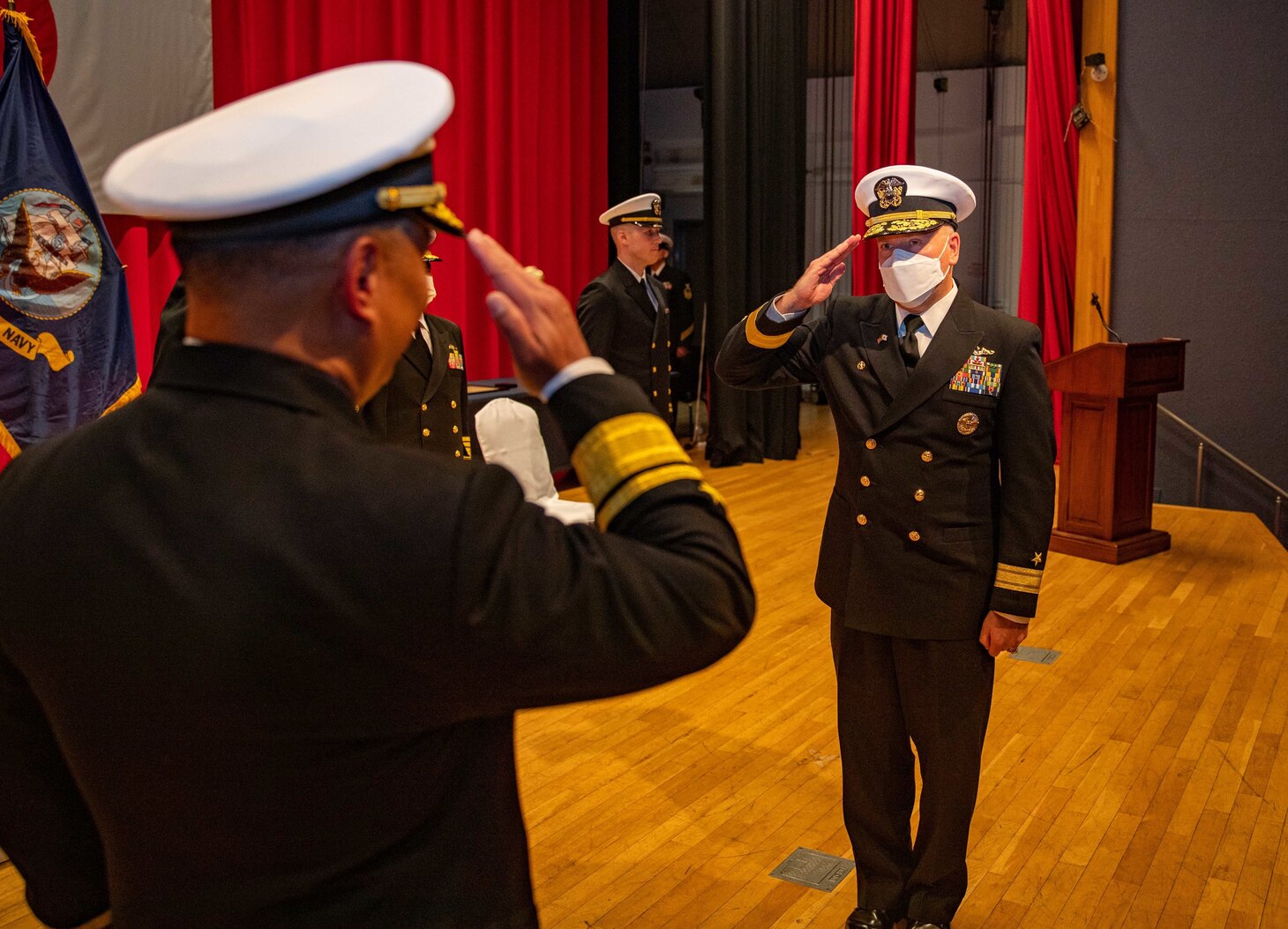 Rear Adm. Rick Seif, right, relieves Rear Adm. Butch Dollaga, left, as commander, Submarine Group 7 during the Submarine Group 7 change of command ceremony at Commander, Fleet Activities Yokosuka, Japan, on April 13, 2022. Submarine Group 7 directs forward-deployed, combat capable forces across the full spectrum of undersea warfare throughout the Western Pacific, Indian Ocean, and Arabian Sea.