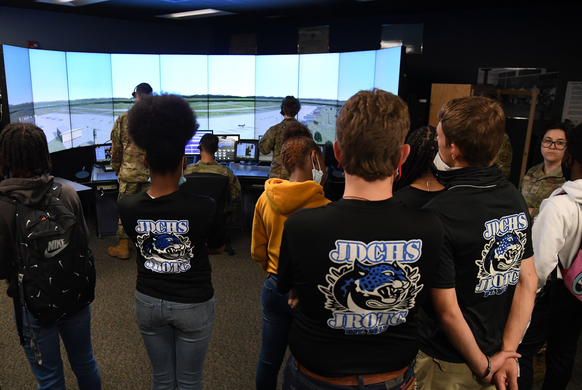 Jefferson Davis County High School Junior ROTC cadets visit an air traffic control tower simulator inside Cody Hall at Keesler Air Force Base, Mississippi, April 12, 2022. Throughout their visit to Keesler, more than 30 cadets received a Hurricane Hunters briefing, visited air traffic control training courses and received a military working dog demonstration. (U.S. Air Force photo by Kemberly Groue)