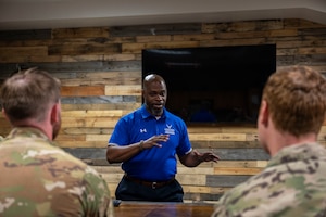 Retired Master Sgt. Jonathan Session, Air Force Wounded Warrior (AFW2) program ambassador, gives a brief to 19th Civil Engineer Squadron explosive ordnance disposal technicians