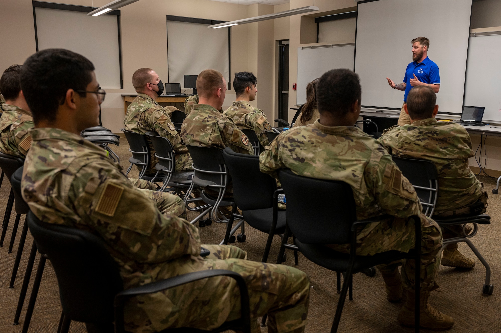 Retired Staff Sgt. Craig Taylor, Air Force Wounded Warrior (AFW2) program ambassador, gives a brief to Airmen assigned to the 19th Security Forces Squadron