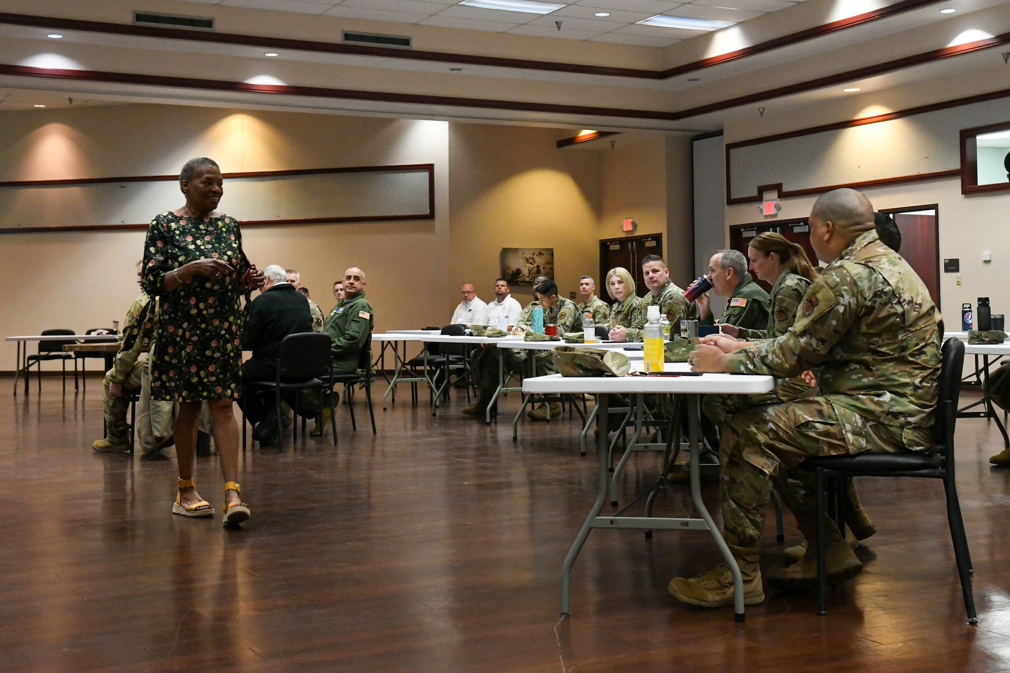 Mary Jernigan, 97th Air Mobility Wing (AMW) sexual assault prevention and response (SAPR) coordinator, explains the SAPR program to 97th AMW leaders at Altus Air Force Base, Oklahoma, April 7, 2022. Jernigan coordinates 24/7 victim care and case management for adult sexual assault victims. (U.S. Air Force photo by Airman 1st Class Trenton Jancze)