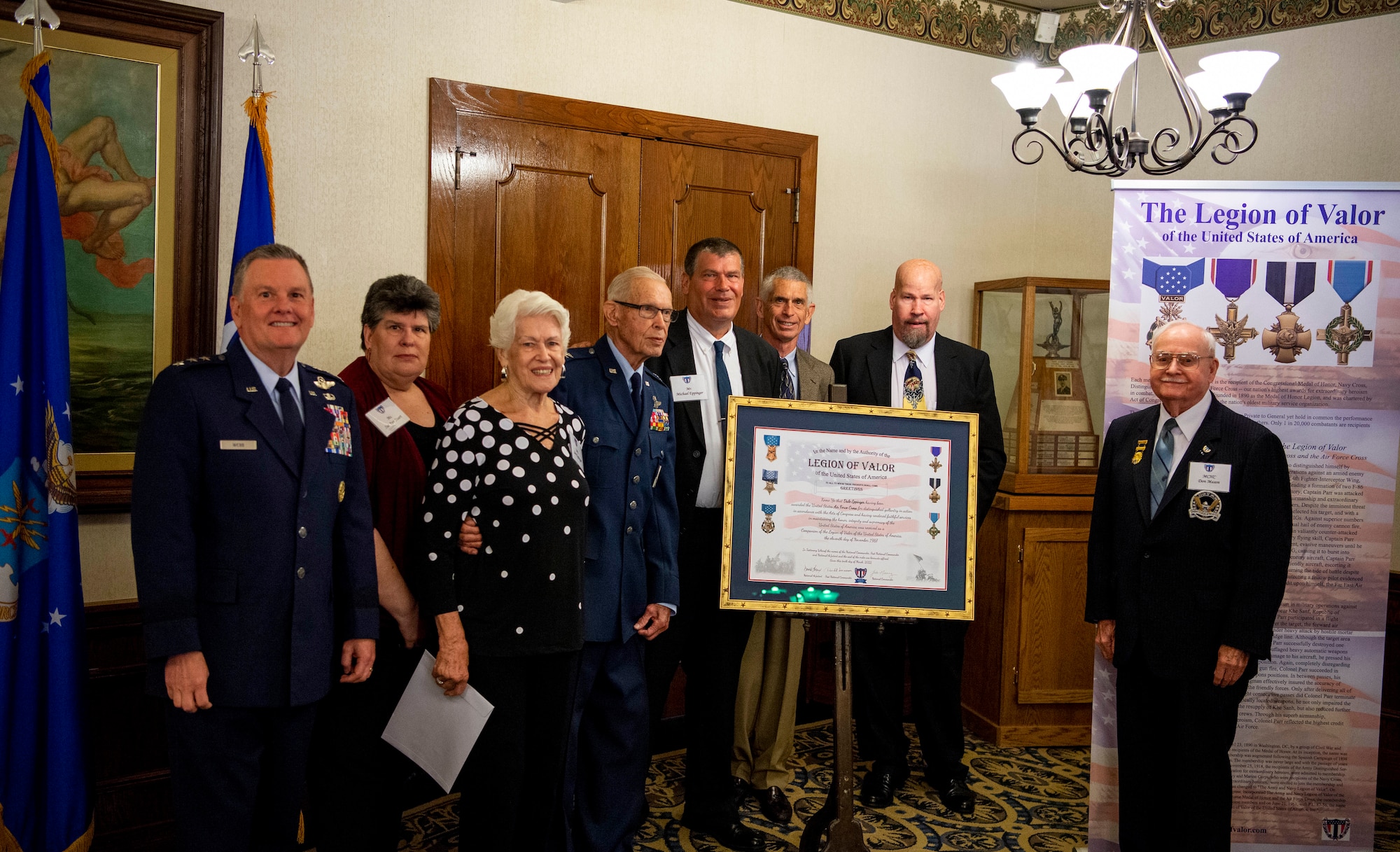 Retired U.S. Air Force  Col. Dale Eppinger (center), San Antonio Legion of Valor Chapter honorary member, and his family, along with Lt. Gen. Brad Webb (left), commander of Air Education and Training Command, pose for a photo