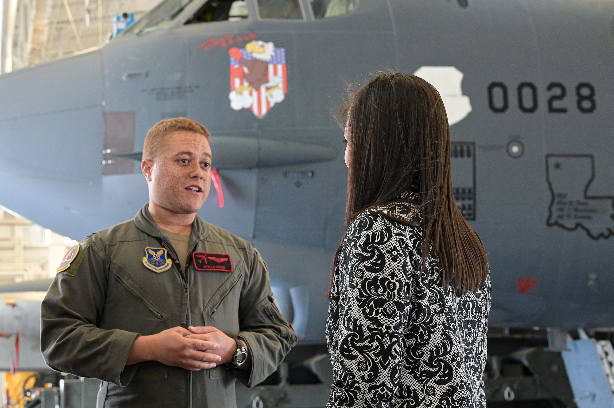 The Honorable Gina Ortiz Jones, Under Secretary of the Air Force, receives a brief by Capt. Kason Pifer, 96th Bomb Squadron B-52H Stratofortress pilot, about the B-52H Stratofortress NC3 capabilities during a visit to Barksdale Air Force Base, Louisiana, April 12, 2022. The NC3 is made of a multitude of ground, air and space components such as receivers and terminals.  (U.S. Air Force photo by Senior Airman Jonathan E. Ramos)