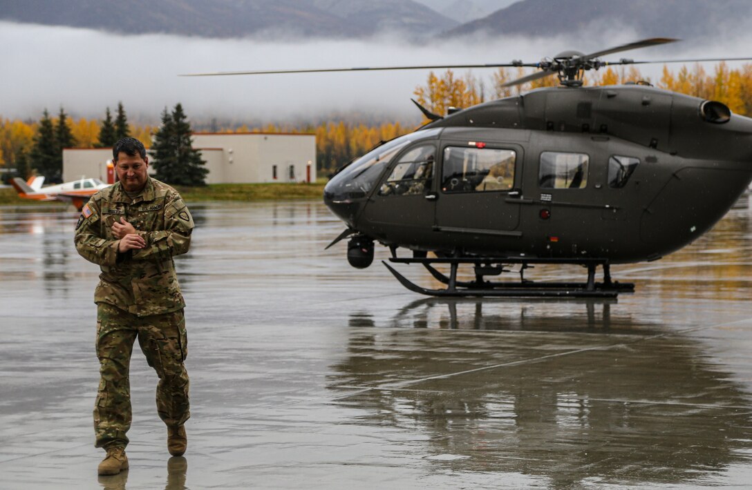 Alaska Army National Guardsman Col. Robert Kurtz steps off a UH-72 Lakota helicopter at the Bryant Army Airfield on Joint Base Elmendorf-Richardson Sept. 30, 2020. The 207th AVN Lakota helicopter systems can be used to provide aerial observation in missions coordinated by the Alaska National Guard’s Counterdrug Support Program and civilian agencies because of its communication and camera capabilities, and its small signature in the sky compared to other military airframes. (U.S. Army National Guard photo by Sgt. Seth LaCount)