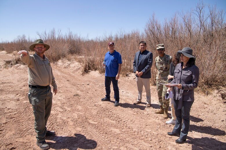 Kenn Evans, Arizona Park Ranger, left, points out a part of the Little Colorado River at Winslow Flood-Control project to U.S. Army Corps of Engineers’ South Pacific Division and Los Angeles District leaders during a tour of the project site April 6 in Winslow, Ariz.