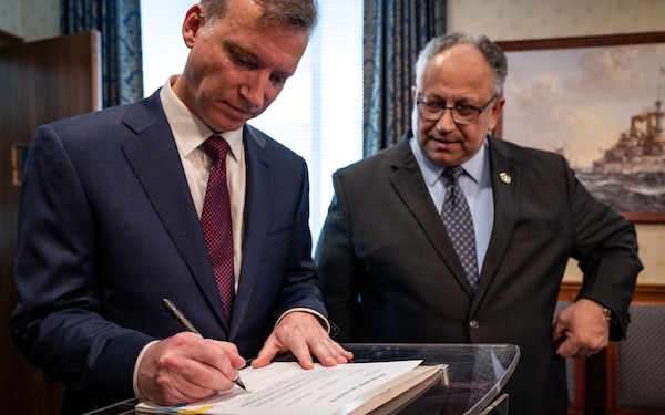 The Honorable Erik K. Raven, left, is sworn in as the 34th Under Secretary of the Navy by Secretary of the Navy Carlos Del Toro April 13, 2022. Raven was confirmed as the 34th Under Secretary of the Navy April 7, 2022.
